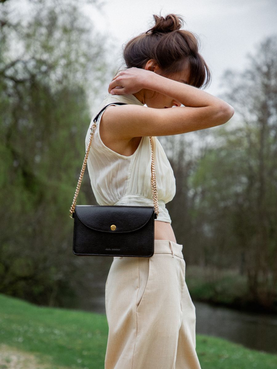 jet-black-leather-clutch-bag-bertille-1960-paul-marius-front-view-picture-w44-l-b