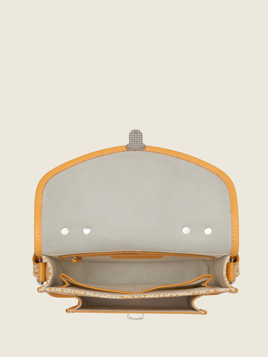 Orange leather handbag Mademoiselle George - Orangeade focus material photo